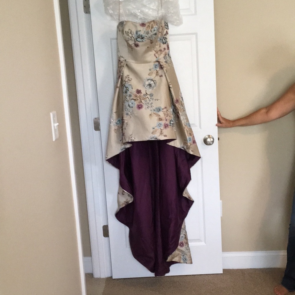 Strapless Janique short/long train dress.
